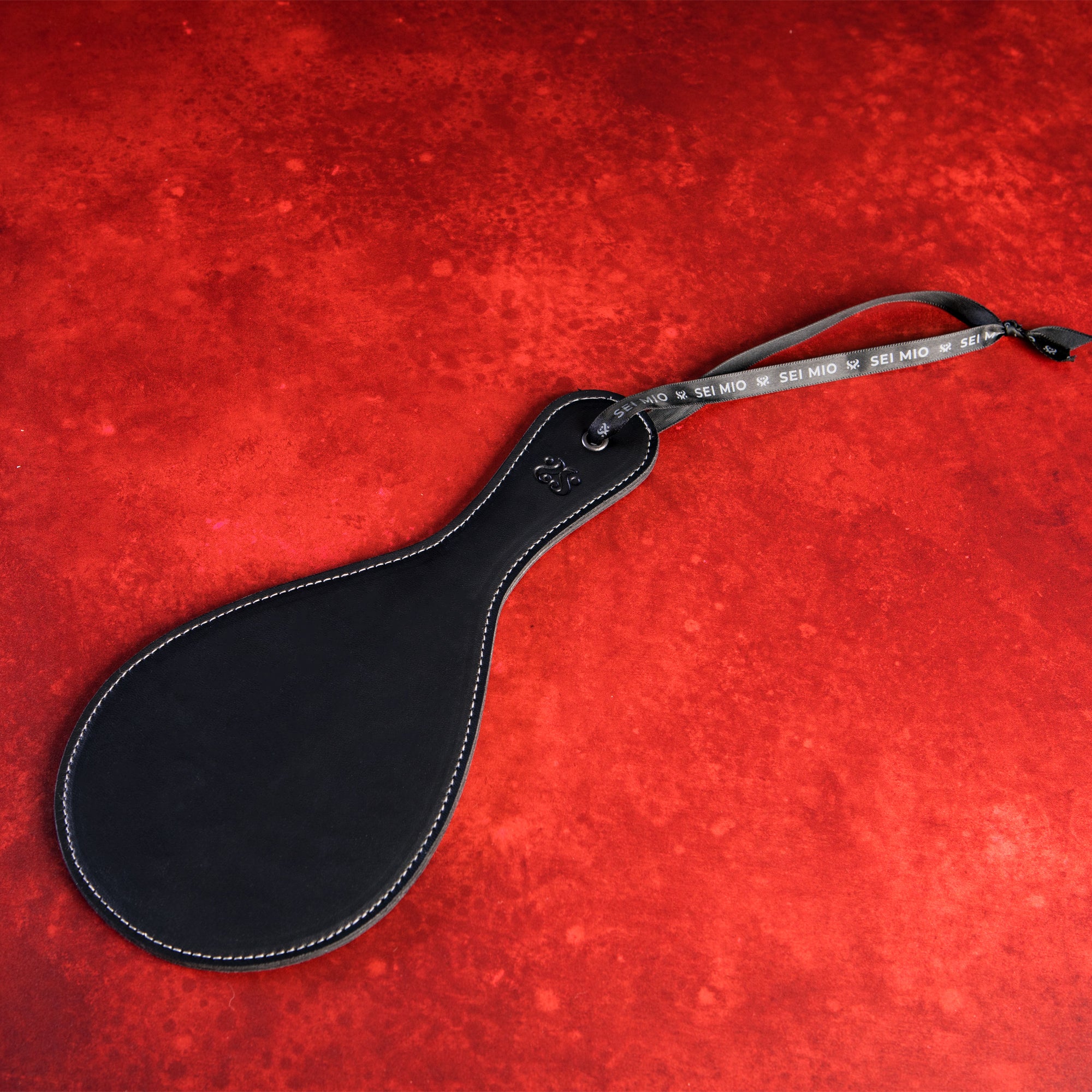 Roundly Chastised - Broad Circular Spanking Paddle