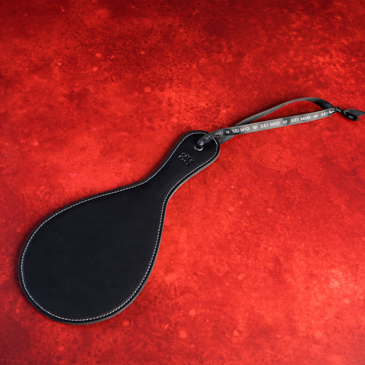Roundly Chastised - Broad Circular Spanking Paddle