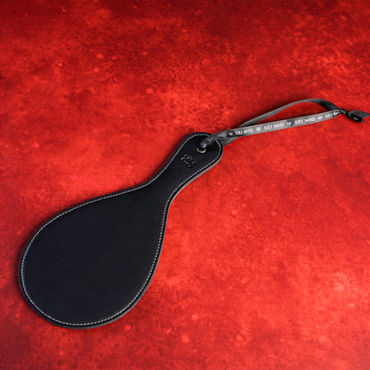 Roundly Chastised - Broad Circular Spanking Paddle